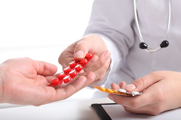 the doctor prescribes medication for the treatment of cervical osteochondrosis